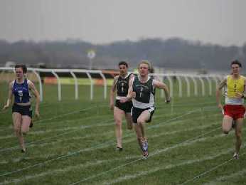 Matthew Fleming (green bib) leading 1st cross-tie from Stacey Downie (blue bib).
