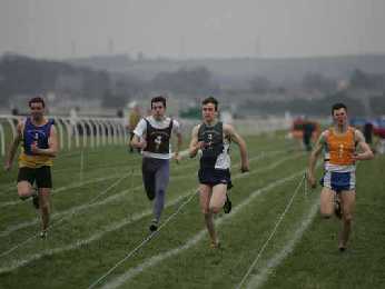 Tom Ashby (green bib) winning 3rd cross-tie from Wallace McGown (yellow bib).