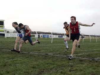 Iskan Barskanmay (second from left) winning 1st cross-tie from Josh Crawford (right).