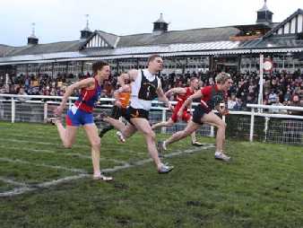 Craig Robertson (right) winning 2nd cross-tie from Drew Bryson (white vest).