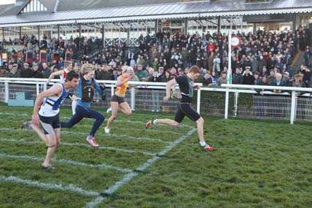 Greg Turnbull winning third cross-tie from John Dunlop (blue bib) and Connor Hedley (black bib).