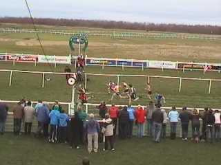 John Glen (red bib) winning the 90 metres Youths Handicap.