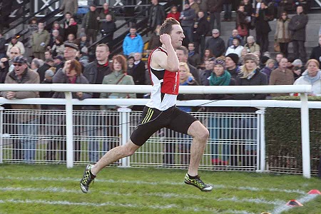 Graeme Lister winning the fourth cross-tie.