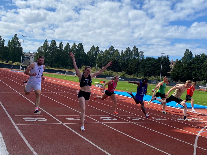 Stacey Downie winning the 153rd New Year Sprint.  From left to right: Craig Bruce (4th), Stacey, Rebecca Grieve (5th), Krishawn Aiken (3rd), Ross Morgan (7th), Iain McEwan (obscured, 8th), Scott Tindle (2nd) and Euan Cunningham (6th).