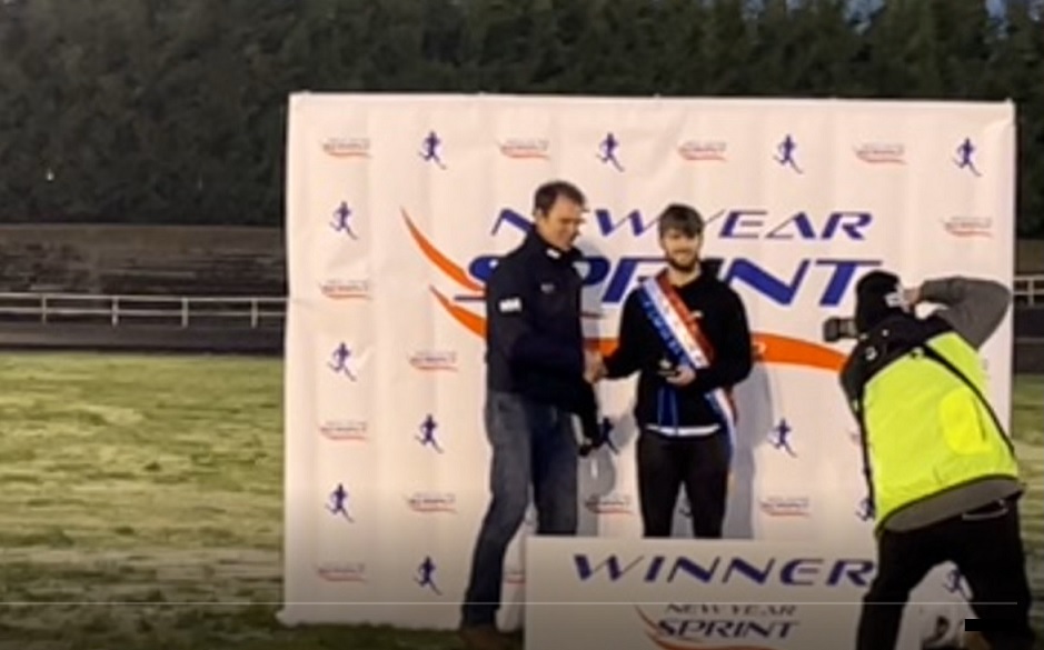 New Year Sprint winner Ryan McMichan with promoter James Cunningham.