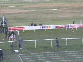 J. Crawford approaching the finishing line in the 800m Youths. S. Devenney is about 15m behind.
